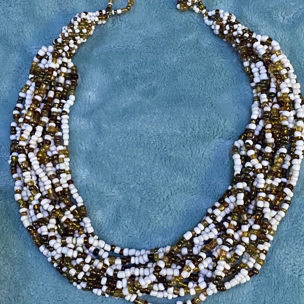 Beautiful Tan, amber and white multi beaded necklace